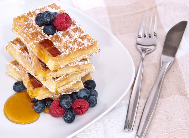 istock Fresh waffles with fruits and sirup 178463102