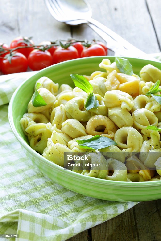 Italian tortellini with basil and olive oil Basil Stock Photo