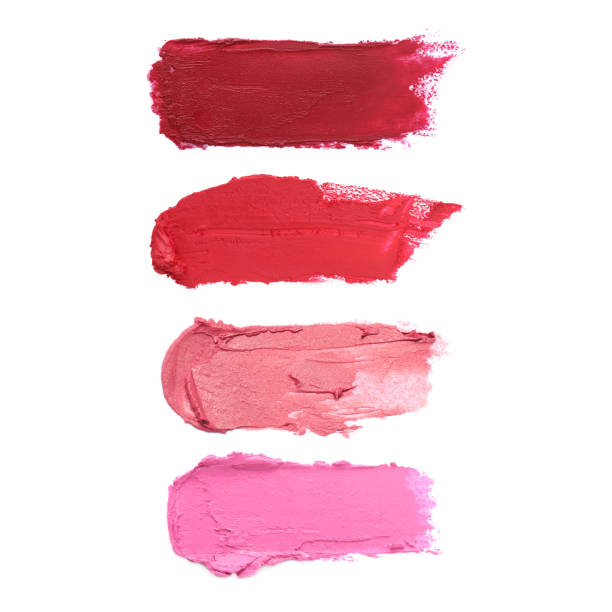 istock Smears of different beautiful lipsticks on white background, top view 1784636692