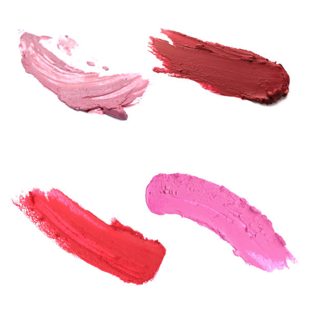 istock Smears of different beautiful lipsticks on white background, top view 1784637247