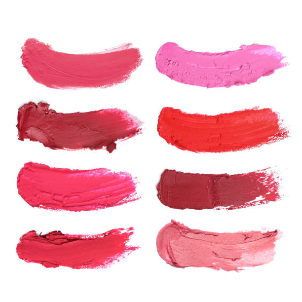 istock Smears of different beautiful lipsticks on white background, top view 1784637249