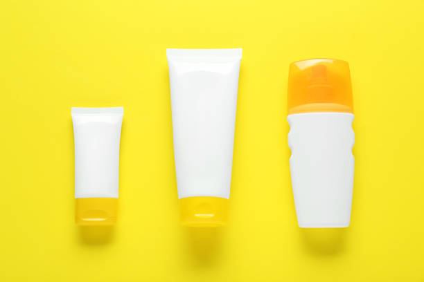 istock Suntan products on yellow background, flat lay 1784641048