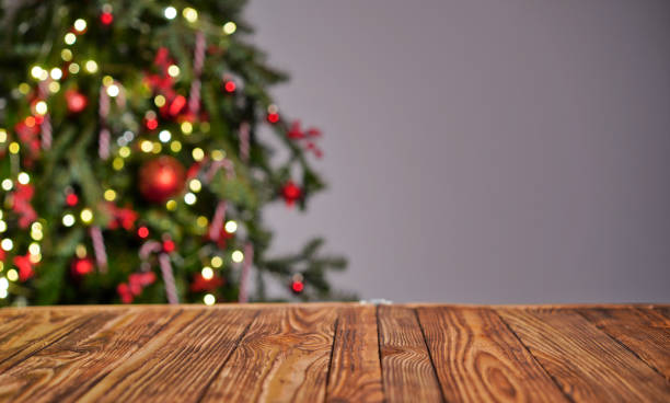 istock Wooden table with Christmas or new year background. Empty space on the table for product display. 1784648712