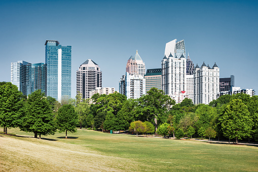 Piedmont Park and skyline of Midtown Atlanta Georgia USA on a sunny day.