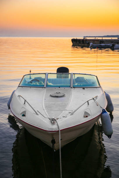 istock Beautiful view of river with moored boat at sunset 1784655258