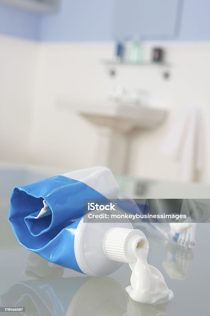 Toothbrush and toothpaste Toothbrush and toothpaste in bathroom Toothpaste Stock Photo