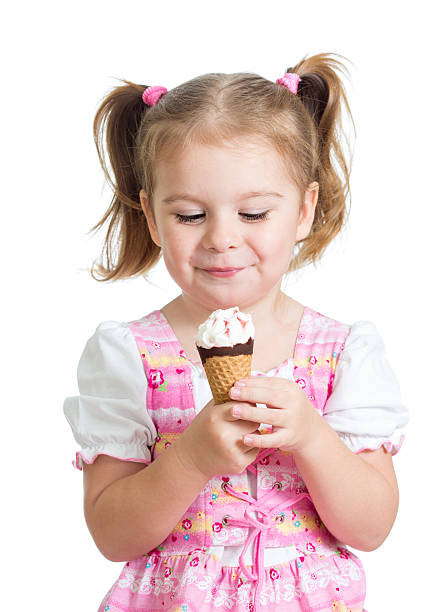 istock smiling kid girl eating ice cream 178466666