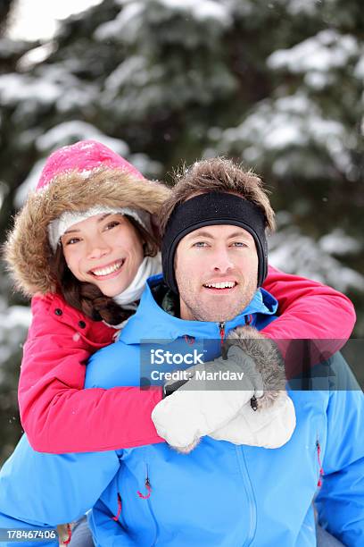 Happy Young Couple In Winter Stock Photo - Download Image Now - 20-29 Years, Active Lifestyle, Adult