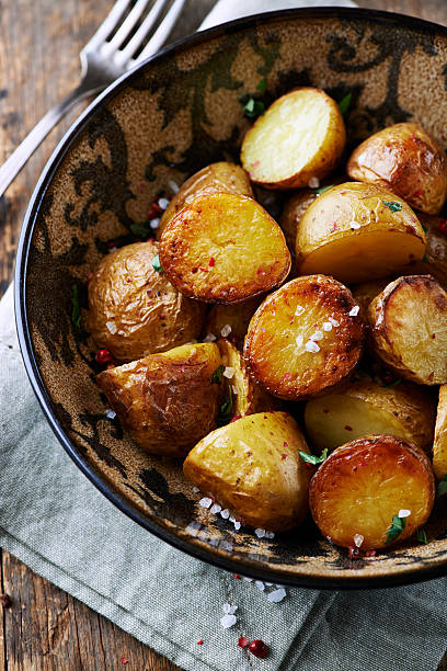 istock Oven-baked potatoes with sea salt and herbs 178467759