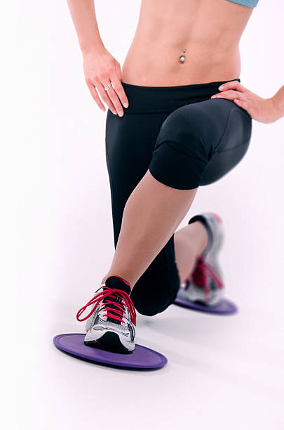 young sporty woman using glide disks