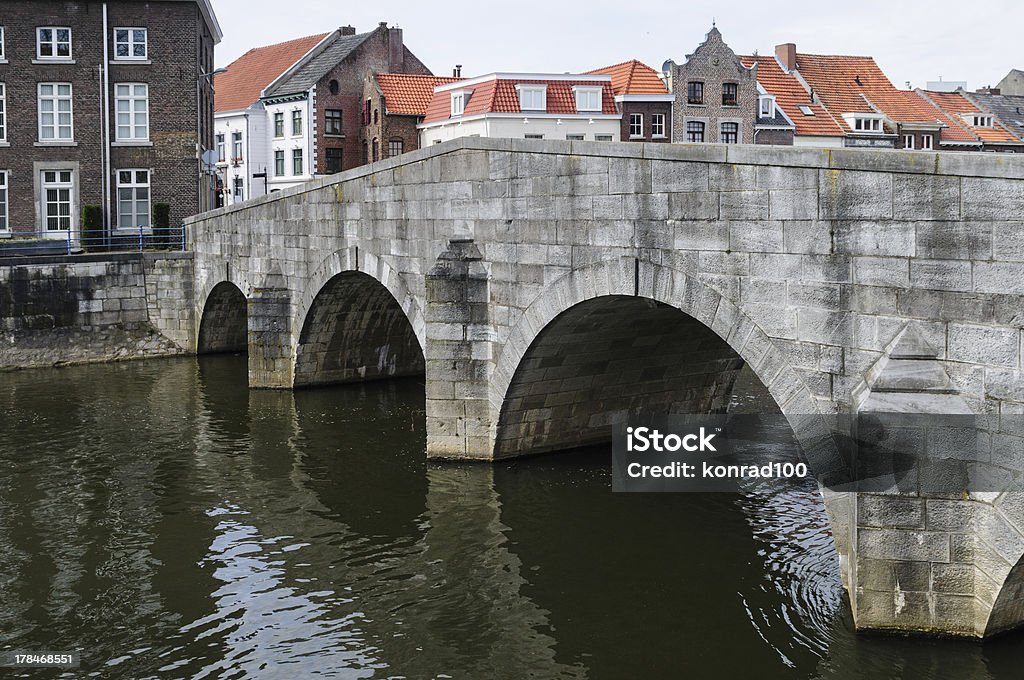 stone bridge over rur in roermond A stone bridge in Roermond Architecture Stock Photo