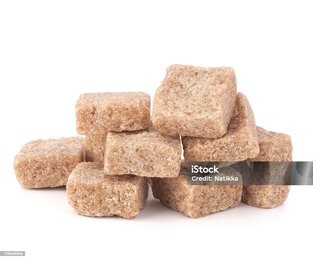 Cubos de cana-de-açúcar, pedaços de marrom - Foto de stock de Amontoamento royalty-free
