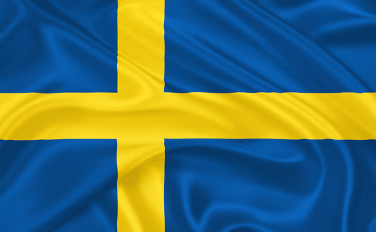 Flag of  Sweden waving with highly detailed textile texture pattern