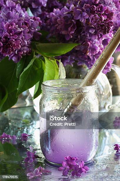 Stilllife With A Bouquet Of Lilacs Stock Photo - Download Image Now - Artist, Beautiful People, Beauty