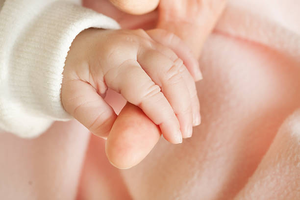 istock Baby and mother hands 178470842