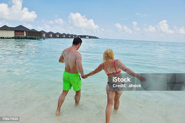 Happy Young Couple At Summer Vacation Have Fun And Relax Stock Photo - Download Image Now