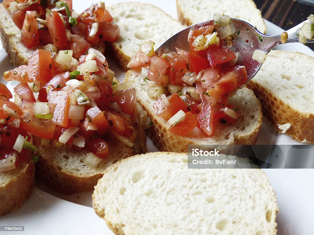 Brusqueta com tomates e cebolas - Royalty-free Alho Foto de stock