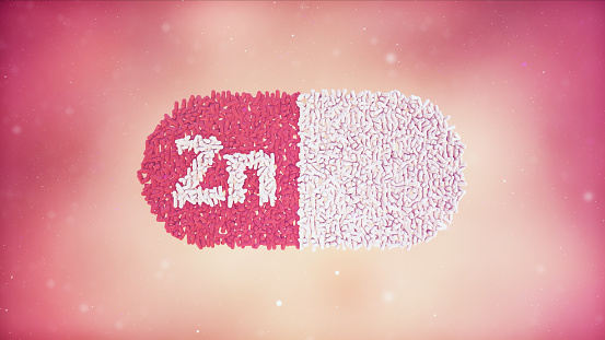 ZN Vitamin Capsule on Gradient color background stock photo