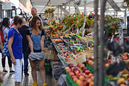 September 1, 2019 - Ottawa, Ontario, Canada: People shopping for fresh produce at an outdoor ByWard farmer's market