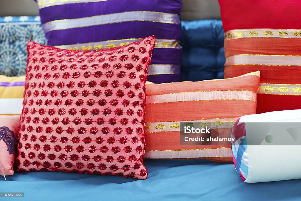 Decorative pillows Interior decoration with colorful fabric pillows Bedroom Stock Photo