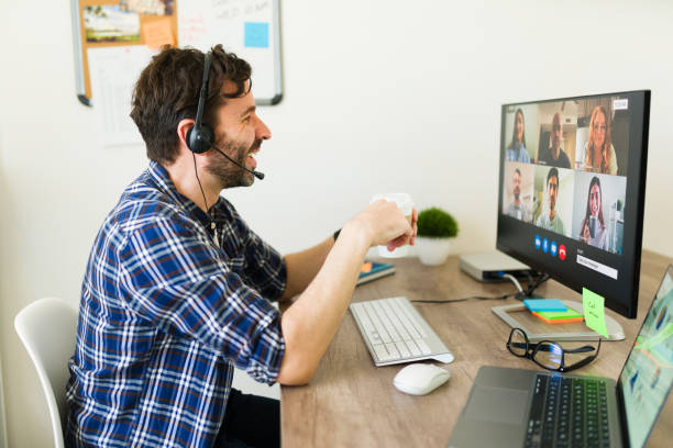 istock Happy man working as a manager having a video call 1784749414