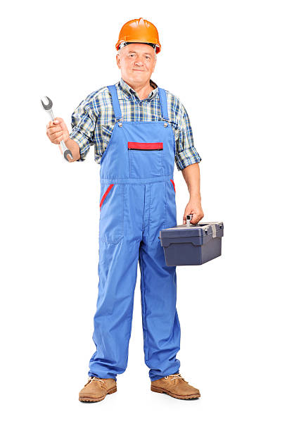 istock Manual worker holding a wrench and tool box 178475061