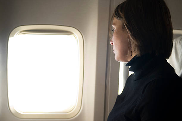 istock Woman traveling by air 178475246