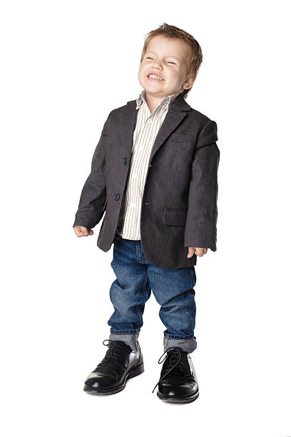 istock Little boy on the big shoes 178476450
