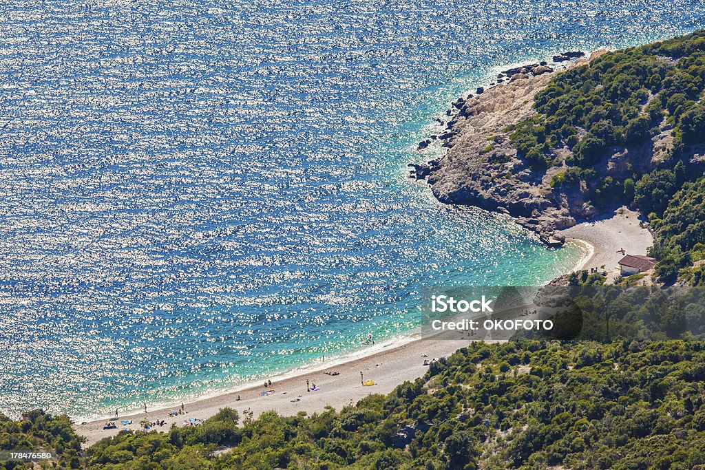 Beach on island Cres Croatia Beach under the village of Lubenice on island Cres Croatia. 95 percent of the water in the swimming areas are of excellent quality. Beach Stock Photo