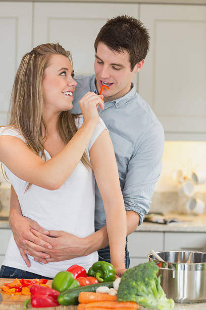 istock Woman having fun by feeding man 178476826