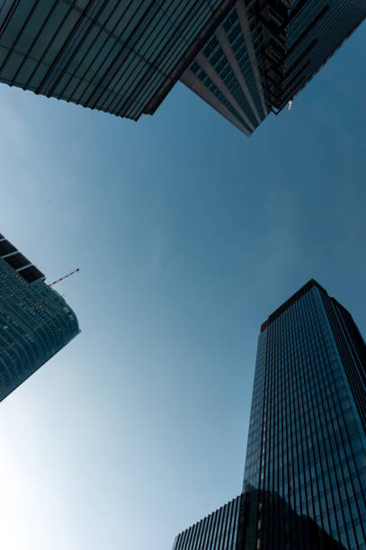 istock modern skyscraper tall building look up, urban street view 1784787644
