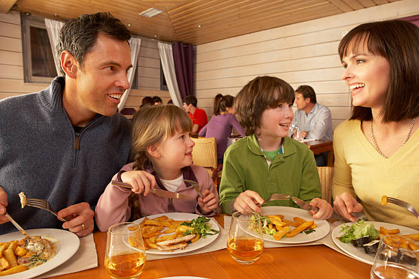 istock Family Eating Lunch Together In Restaurant 178479422