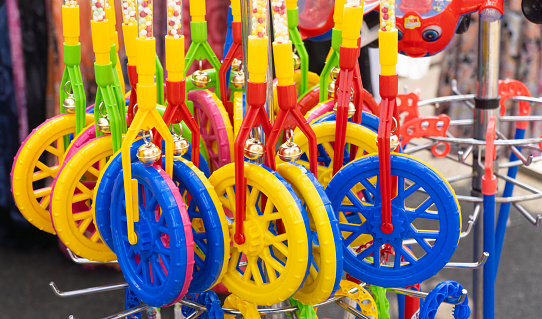 Detail of colourful toys at a stand on amusement park in wiesbaden germany
