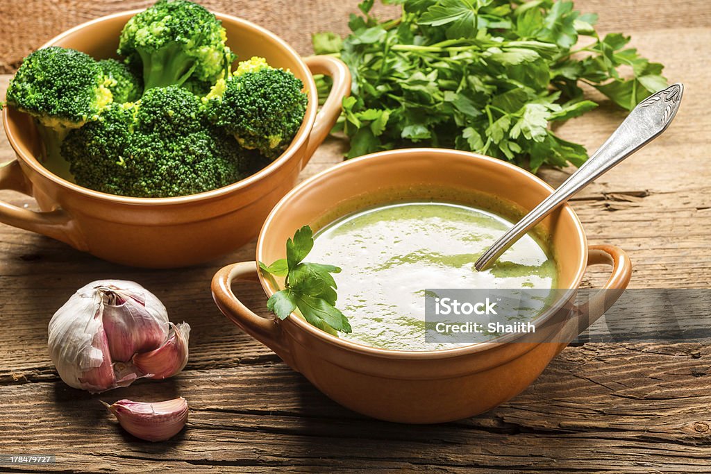 Soup made of fresh broccoli, garlic and parsley Soup made of fresh broccoli, garlic and parsley. Appetizer Stock Photo