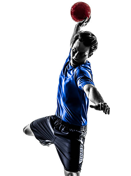 istock Silhouette of a young man throwing a ball 178479995