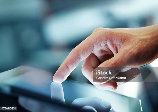 Tablet In Hand Stock Photo - Download Image Now - Digital Tablet, Touching, Computer Monitor