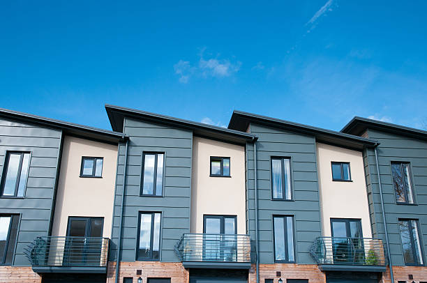 istock Row of modern terraced townhouses 178481017