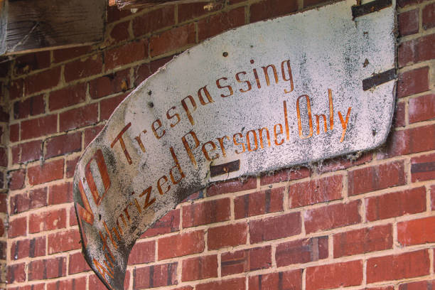 istock No trespassing sign on an abandoned factory 1784811091
