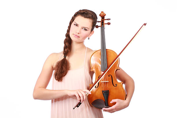 istock young girl violinist playing 178481174