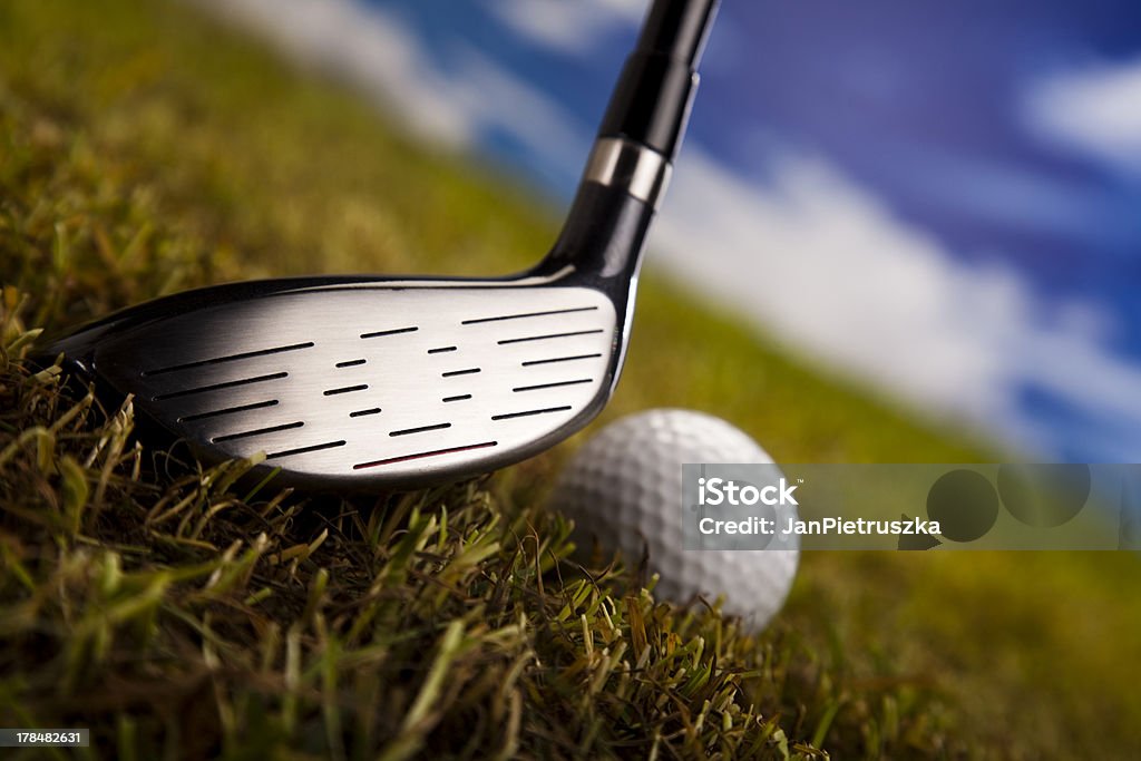 Playing golf, ball on tee Golf game Close-up Stock Photo