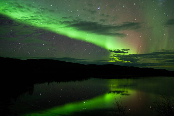 istock Night Sky Stars Clouds Northern Lights mirrored 178483034