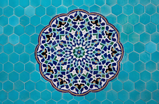 Blue arabesque design inside a very old mosque in Yazd, Iran.