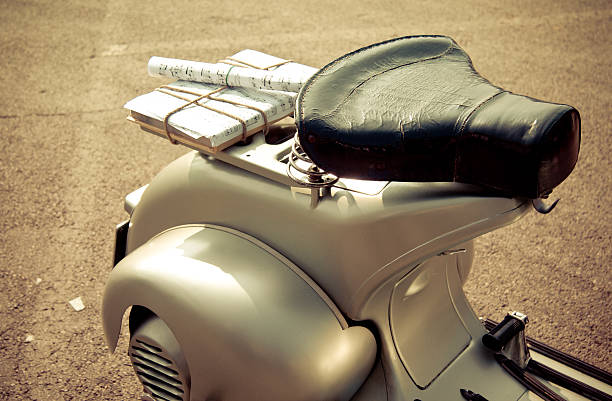 Vintage italian scooter and music paper stock photo