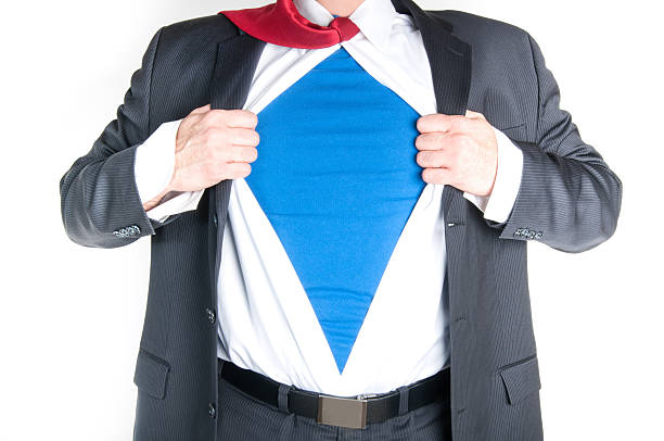 istock Businessman pulling apart shirt to reveal he is a superhero 178484534