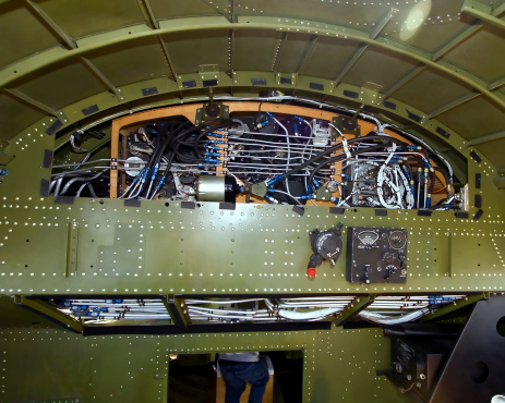 Part of the interior of a B-17 Bomber on display with panel removed.
