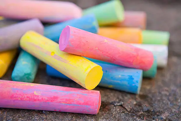 Close-up of colorful crayons outdoors for drawing