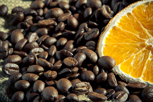 Coffee beans with orange stock photo