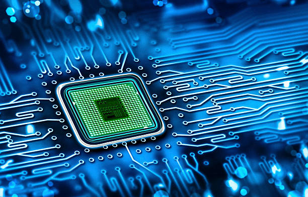 Green microchip set in a blue printed circuit board microchip integrated on motherboard chips stock pictures, royalty-free photos & images