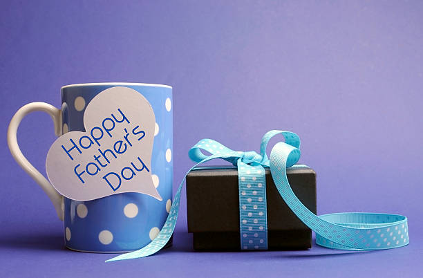 istock Happy Fathers Day message on blue coffee cup with gift 178487336