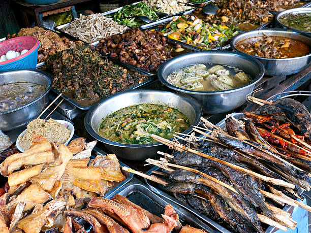 Food at kandal Market in Phnom Penh Fish and other Cambodian food at the Kandal Market in Phnom Penh. cambodia food stock pictures, royalty-free photos & images
